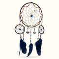 Peacock blue triple ring dreamcatcher with navy feathers, beads, and metal accents