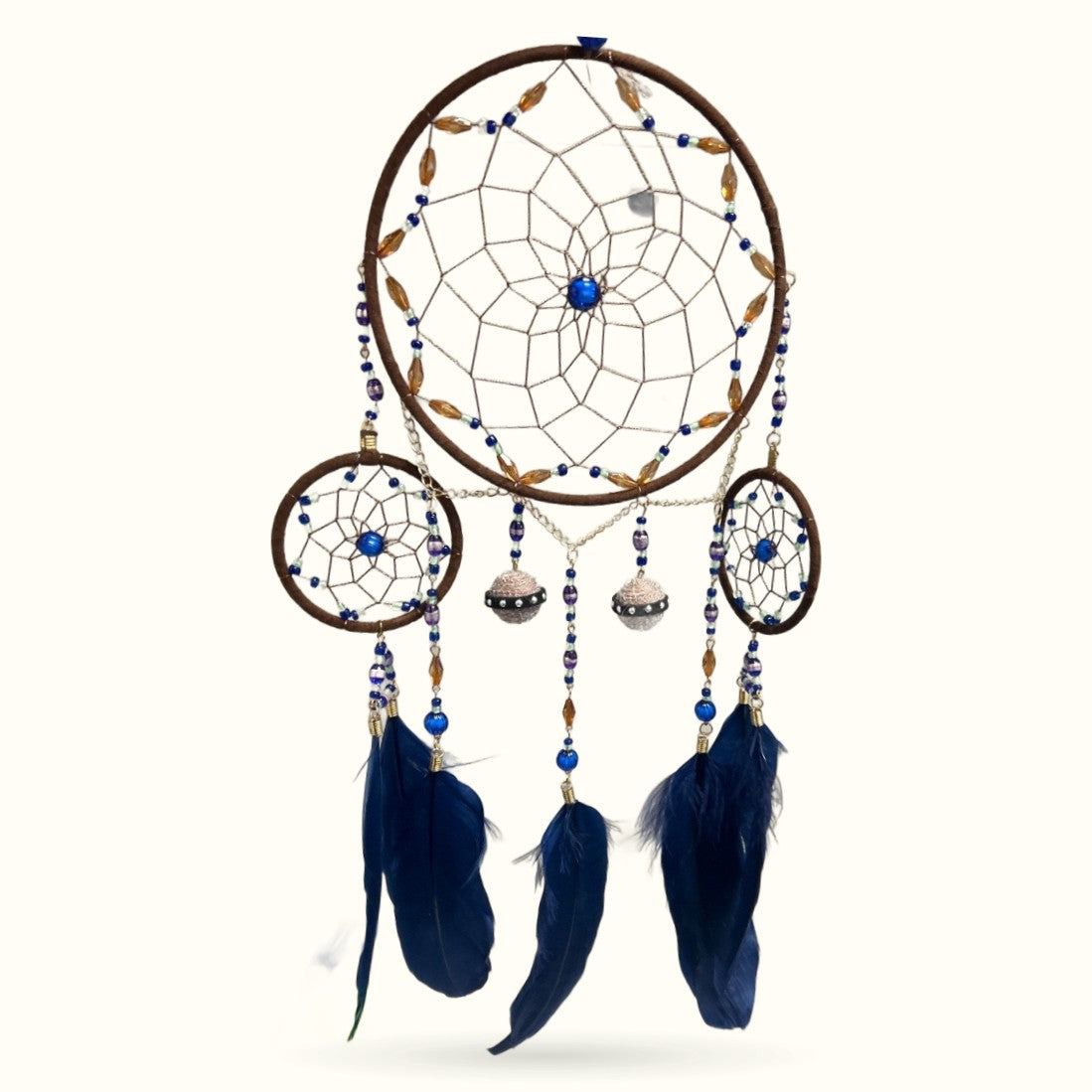 Peacock blue triple ring dreamcatcher with navy feathers, beads, and metal accents