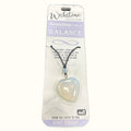 Moonstone heart pendant necklace on black cord with product packaging from Wishstone Collection