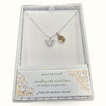 Silver butterfly necklace with rose gold teardrop charm in Equilibrium branded gift box