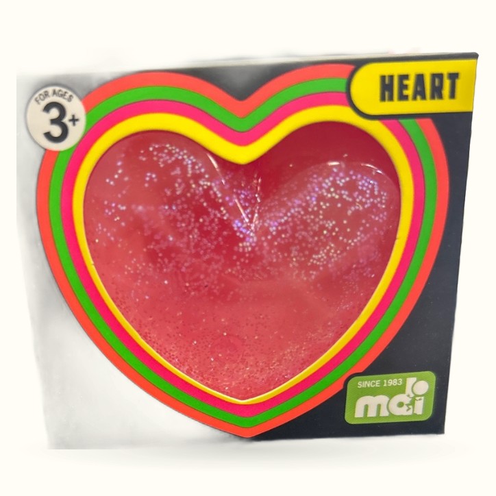 Smoosho Glow in the Dark Squishy Heart with red center and colorful rainbow layered borders
