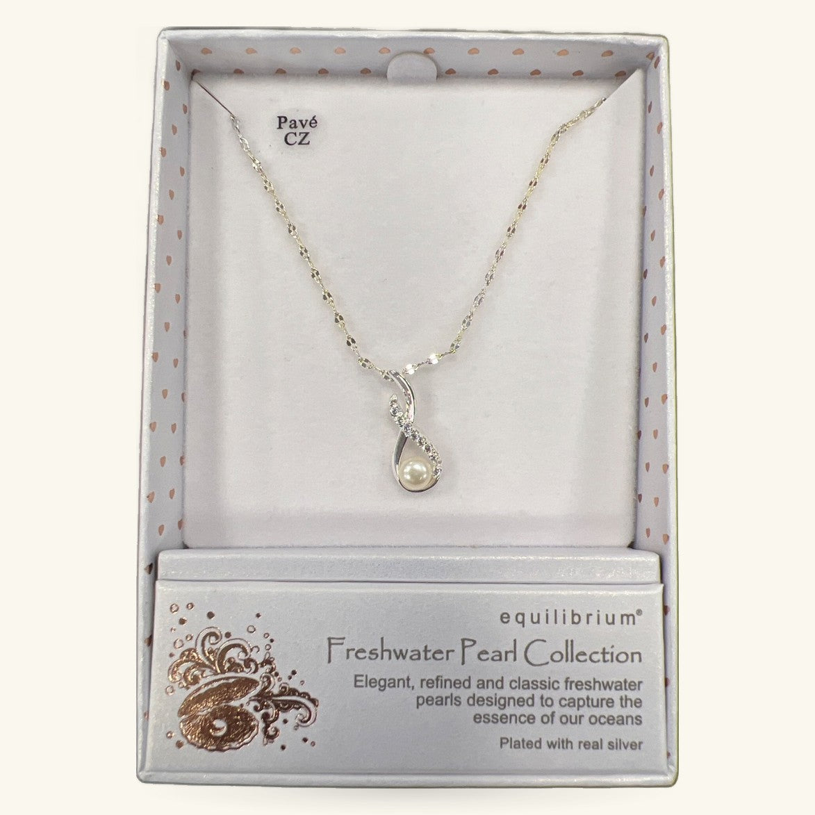 Silver freshwater pearl pendant necklace in Equilibrium branded gift box with polka dot lining