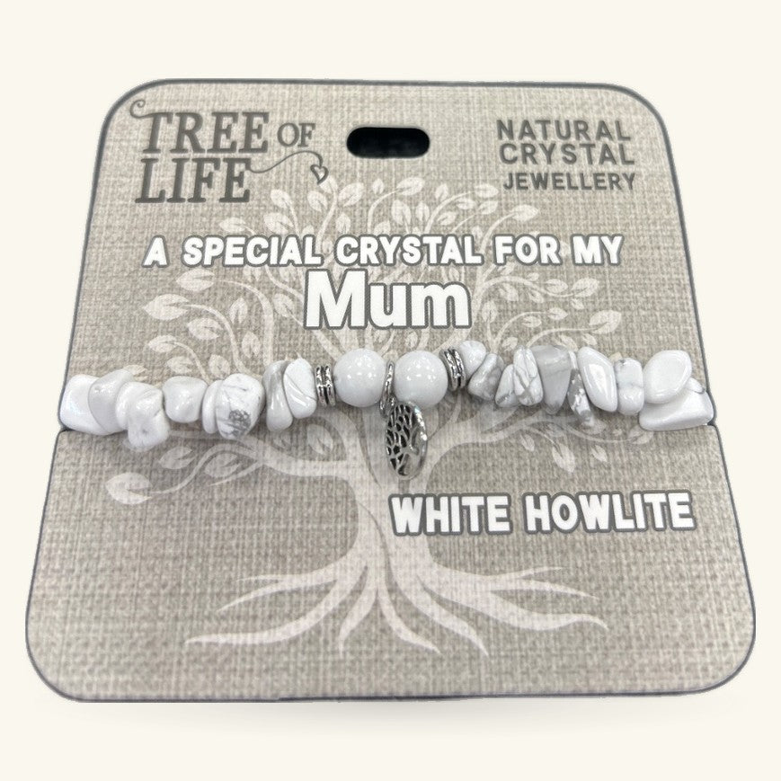 White Howlite chip bracelet with silver accent charm on branded Tree of Life packaging
