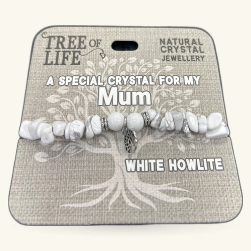 White Howlite chip bracelet with silver accent charm on branded Tree of Life packaging