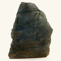Labradorite polished stone showing dark grey and blue iridescent layers, roughly 235g