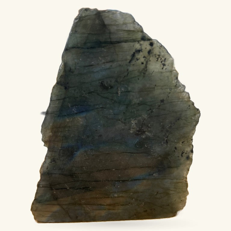 Labradorite polished stone showing dark grey and blue iridescent layers, roughly 235g