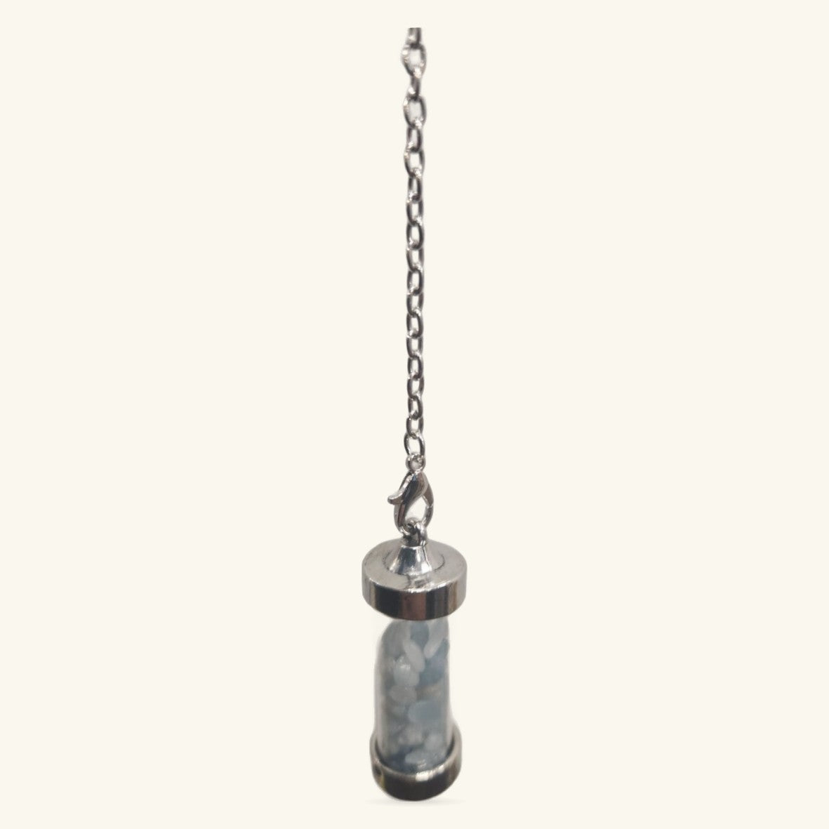 Silver-capped aquamarine glass crystal pendulum with metal chain and lobster clasp