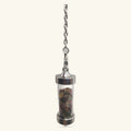 Silver-capped glass cylinder pendulum filled with mixed tumbled crystals, suspended from a chain