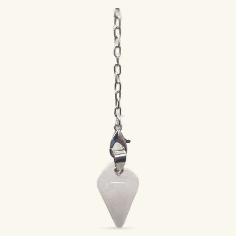 Clear quartz point pendulum with metal lobster clasp attached to fine silver chain