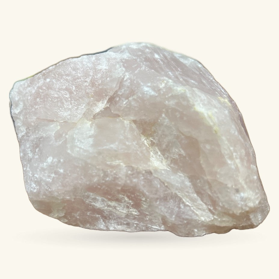 Raw rose quartz crystal specimen, 772g, showing translucent peachy-white coloring with natural rough edges