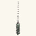 Green aventurine stone wrapped in silver wire on a chain with small heart charm detail