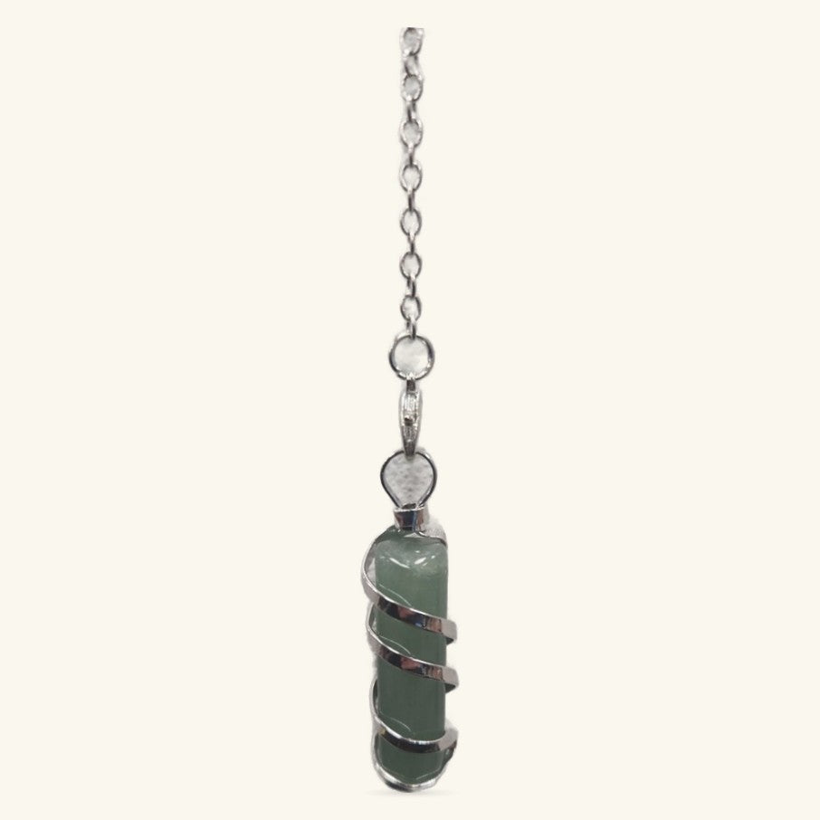 Green aventurine stone wrapped in silver wire on a chain with small heart charm detail
