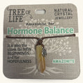 Amazonite Tree of Life pendant necklace on brown cord with product information card