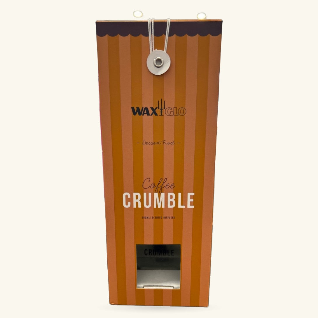 Coffee Crumble scented diffuser by Waxiglo in warm orange striped packaging with silver hanging loop