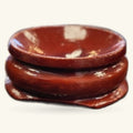 Wooden crystal sphere stand with rich mahogany finish and white stone inlays, three-tiered design