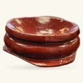 Wooden crystal sphere stand in rich reddish-brown wood with curved bowl shape and decorative base ring