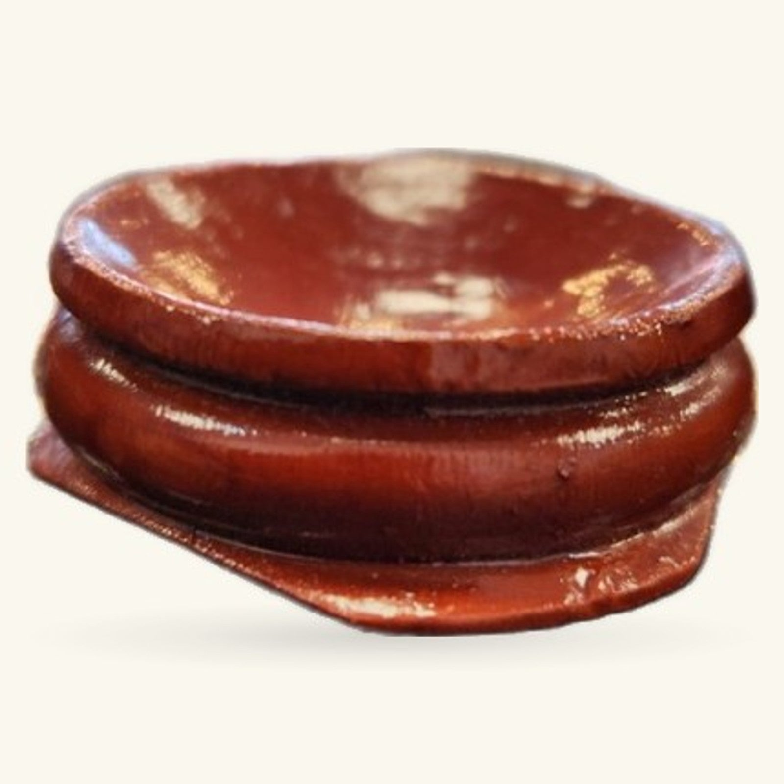 Wooden crystal sphere stand in rich reddish-brown wood with curved bowl shape and decorative base ring