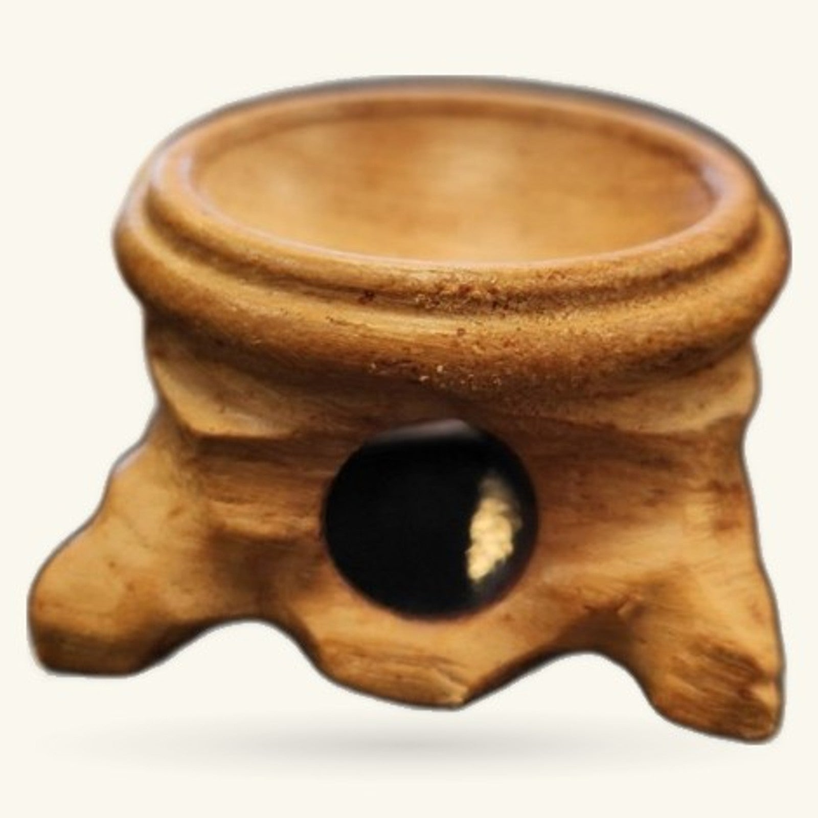 Wooden crystal stand with round top bowl and three curved feet, natural timber finish