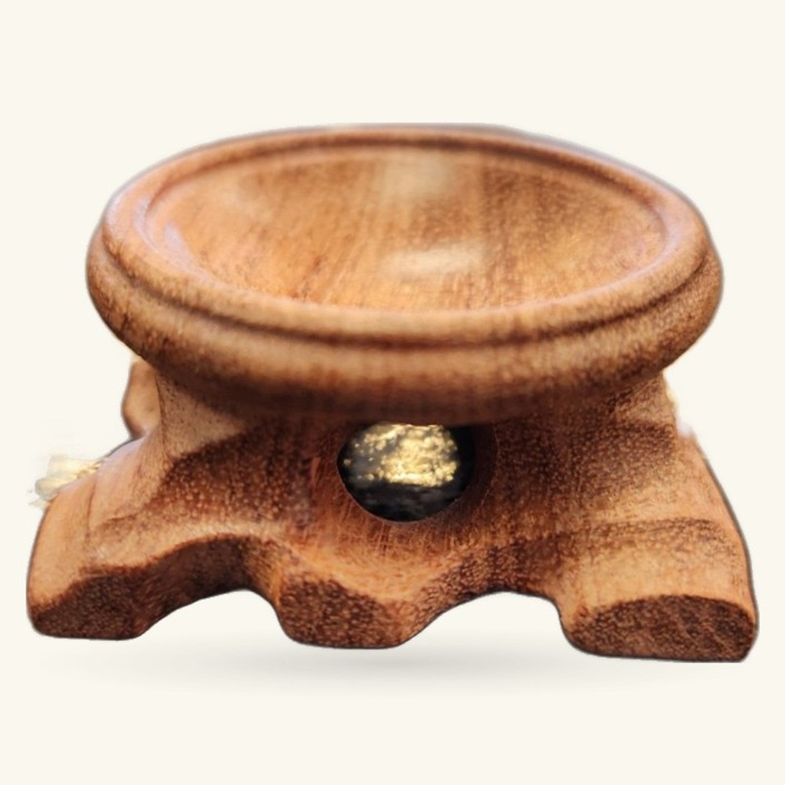 Wooden elephant-shaped crystal sphere stand with rounded top bowl and gold-toned eye detail
