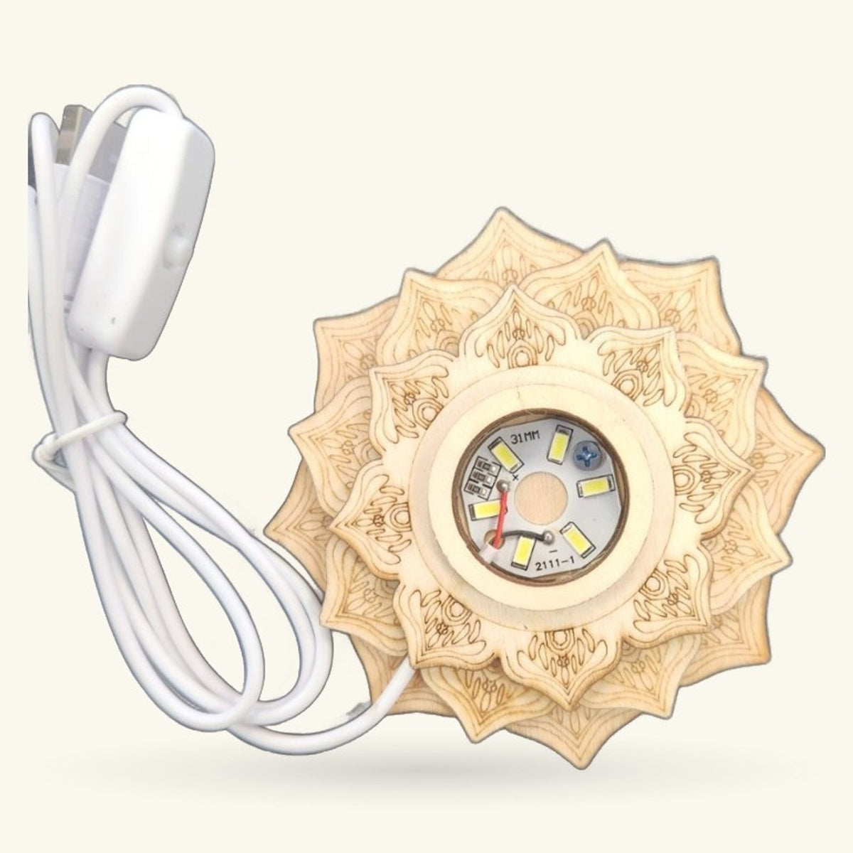 Wooden lotus-shaped LED light with ornate carved details, white cord, and visible circuit board center
