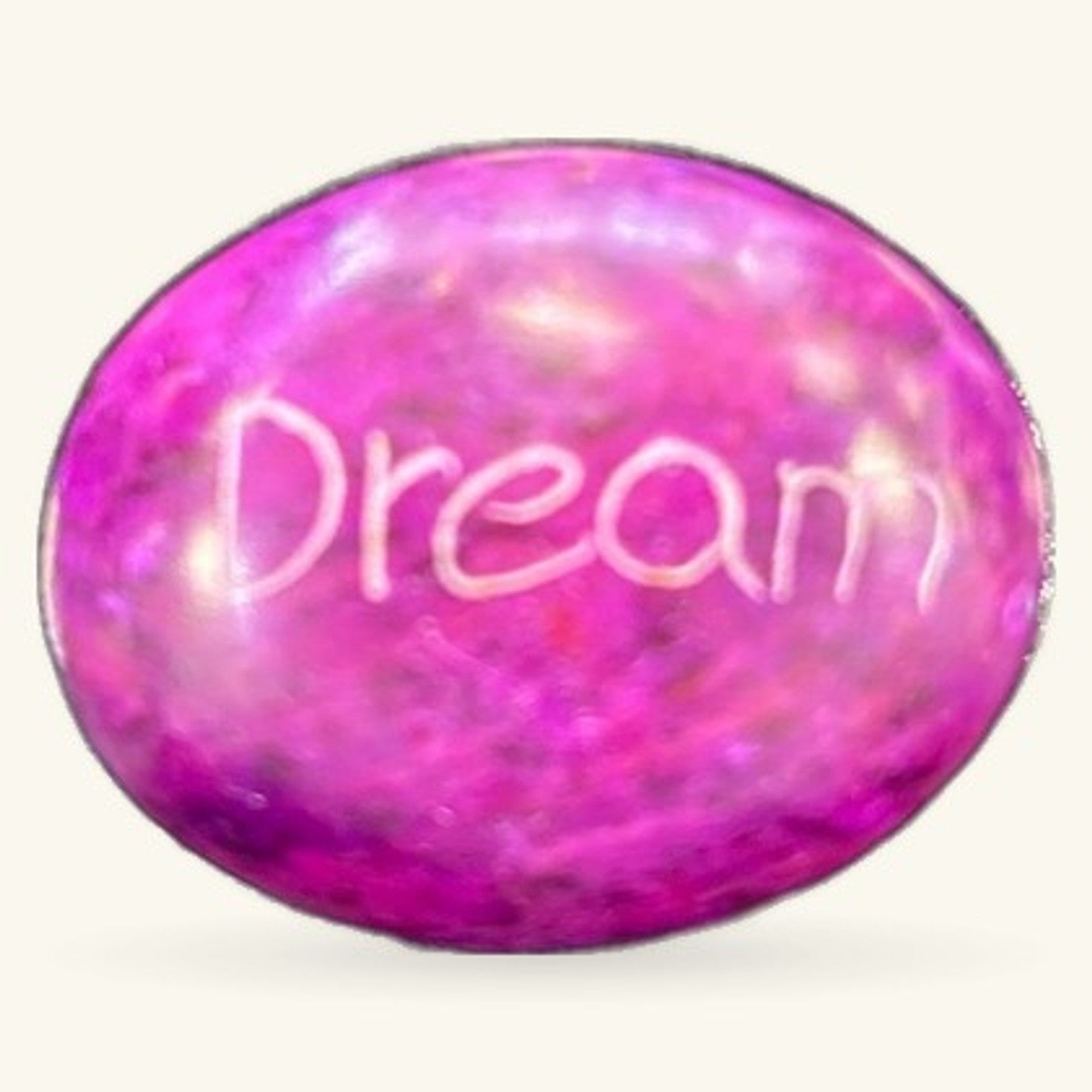 Purple marbled inspirational rock with 'Dream' engraved in white text on smooth surface