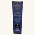Goloka Manifestations Celestial Blessing reed diffuser in navy blue box with gold geometric design and black bottle