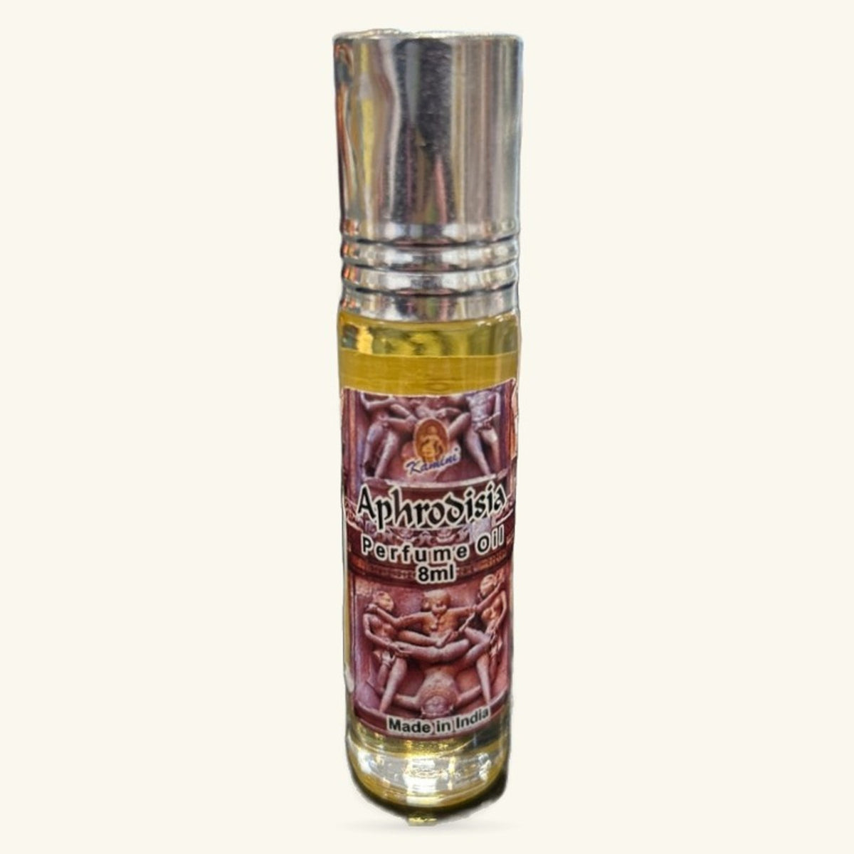 Aphrodisia Perfume Oil by Kamini in an 8ml glass bottle with metallic cap and burgundy label