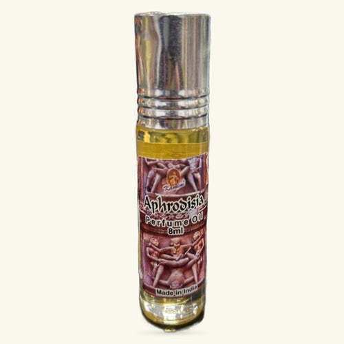 Aphrodisia Perfume Oil by Kamini in an 8ml glass bottle with metallic cap and burgundy label