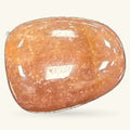 Polished strawberry quartz tumble stone with reddish-brown coloring and white inclusions