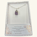 Amethyst gemstone pendant on silver chain in Equilibrium branded gift box
