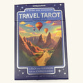 Lonely Planet Travel Tarot card deck box featuring hot air balloons over a desert canyon landscape at sunset