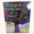 The Magical Nordic Tarot box by Jayne Wallace, featuring a woman gazing at a starry sky with a deer and snowy landscape below