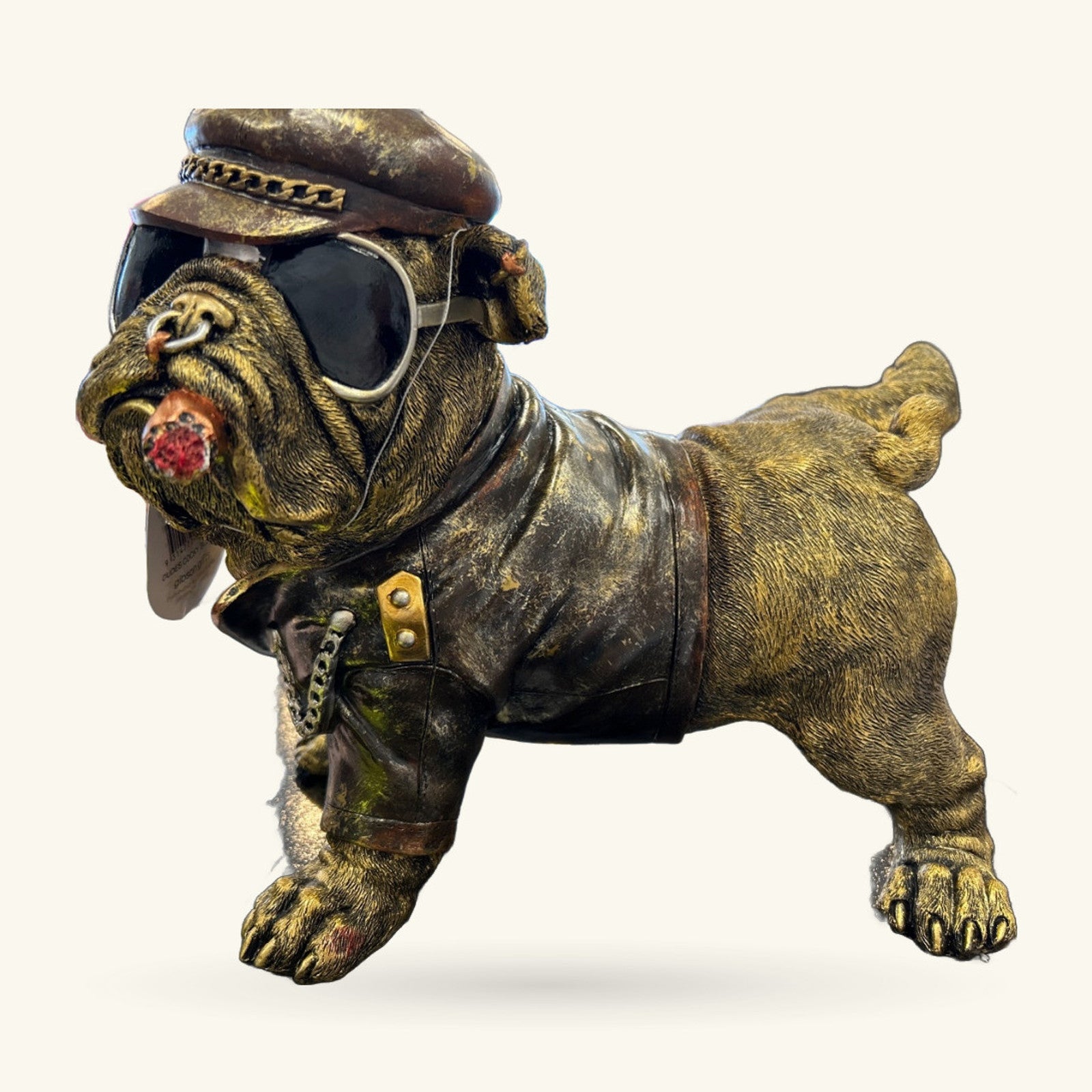 Bronze-finish bulldog figurine, 32cm tall, wearing captain's hat, goggles, leather jacket and chain collar