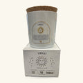 Virgo zodiac candle in white frosted glass with cork lid, displayed with its branded box