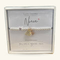 Niece Life Charms bracelet in silver and gold with leaf charms, displayed in branded gift box