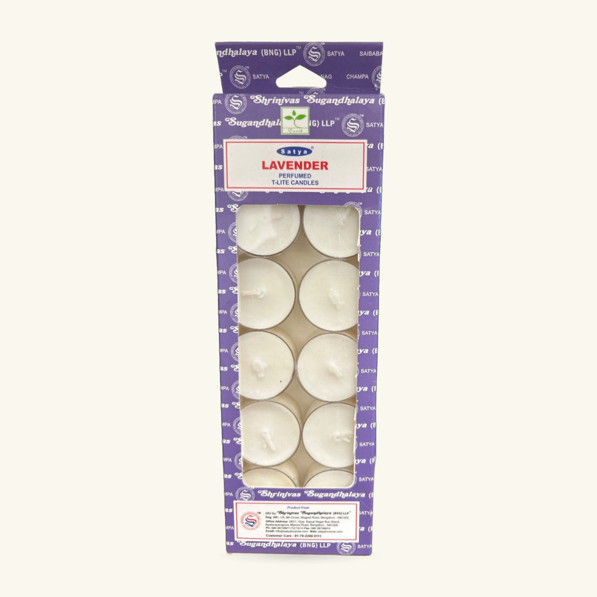 Pack of 12 lavender-scented tea light candles in clear plastic container with purple Satya packaging