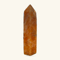 Orchid Calcite Point 8cm, honey-brown polished stone with pointed top
