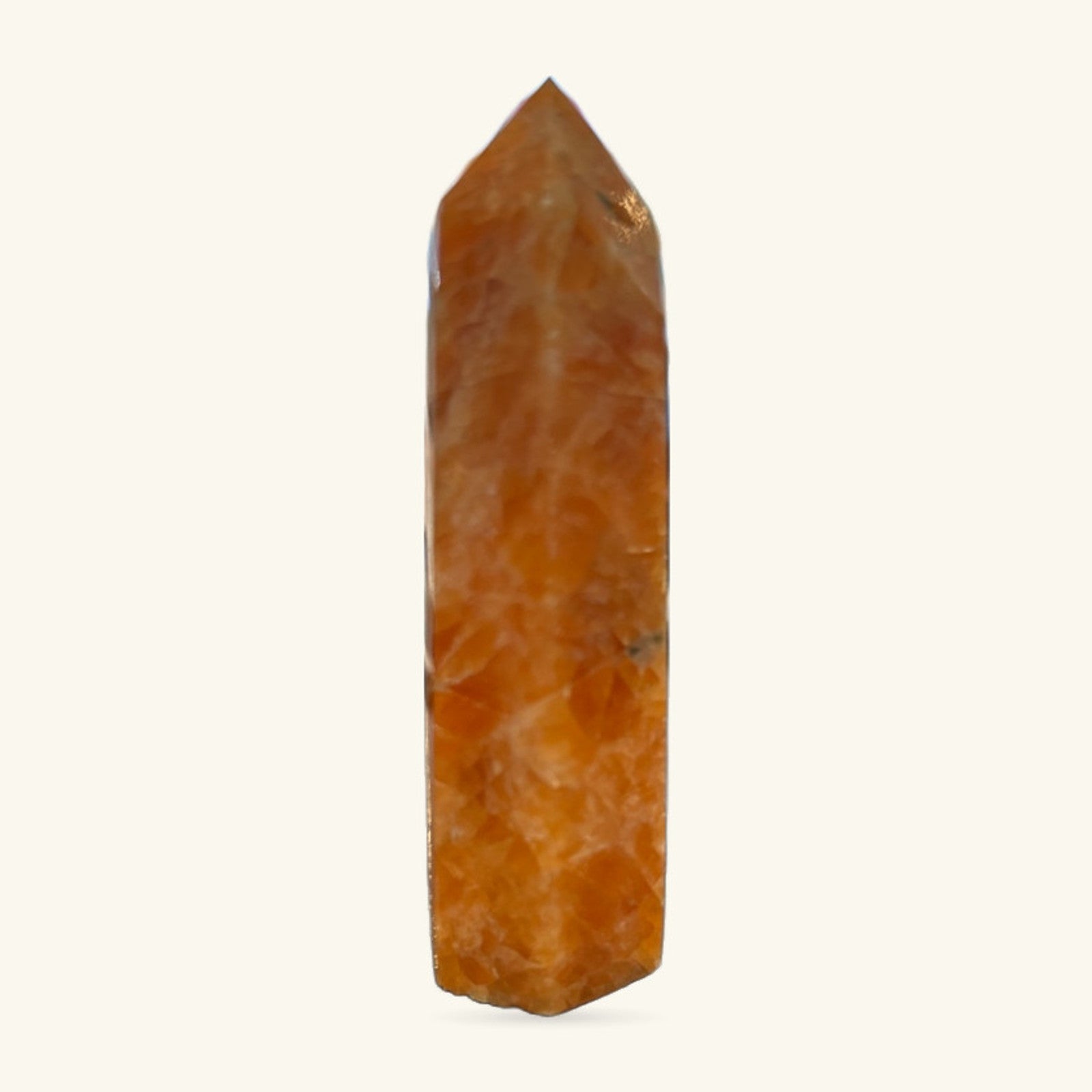Orchid Calcite Point 8cm, honey-brown polished stone with pointed top