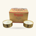 Organic Goodness Rose Tealight 12-pack box with decorative lid and two gold-wrapped tealight candles displayed in front