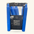 Pack of blue spell candles with black packaging labelled Wisdom Spell Candles