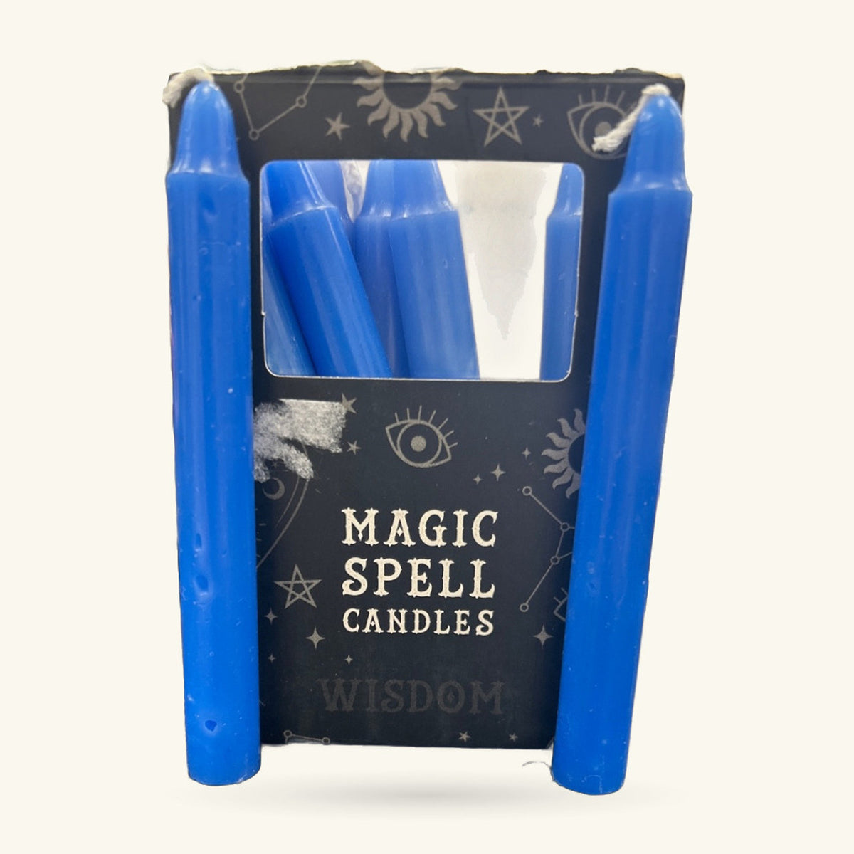 Pack of blue spell candles with black packaging labelled Wisdom Spell Candles