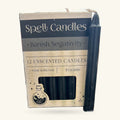 Box of 12 black unscented spell candles for banishing negativity, with one candle displayed beside it.