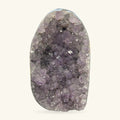 Amethyst cave geode, 243g, pale purple crystals lining hollow interior, polished rounded form