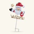 Tin Santa garden sign with red hat, white beard, and gold star wand, holding welcome text on stake