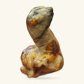 Carved agate cobra sculpture with cream, tan and rust striping, head raised in striking pose