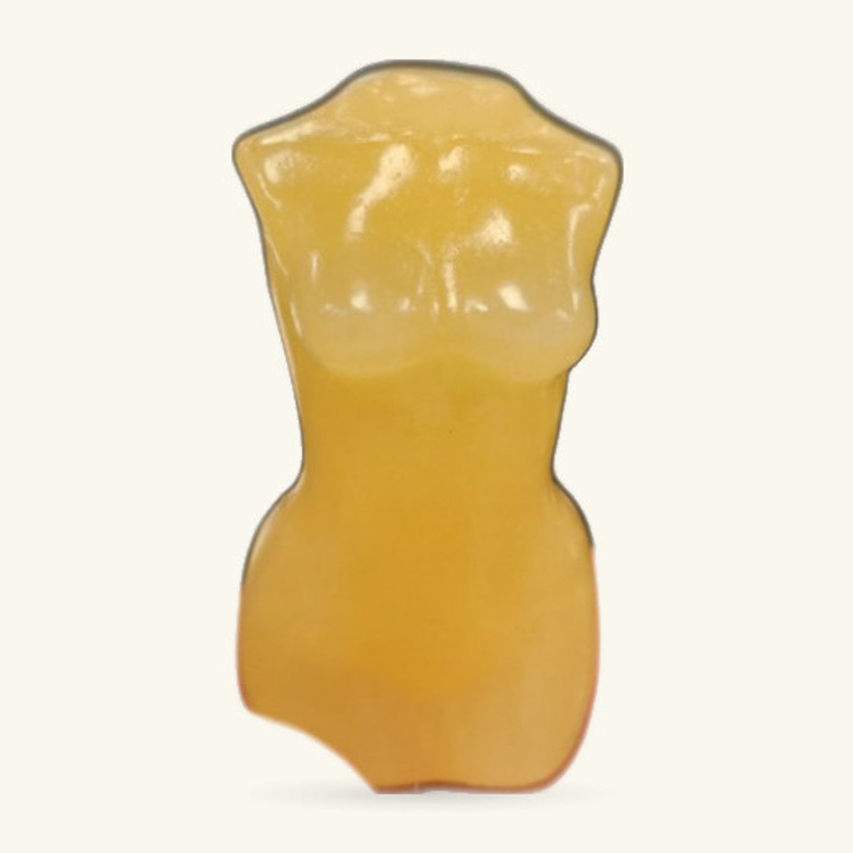 Orange calcite body carving, hand-sized, smooth polished finish with natural translucence at the top.