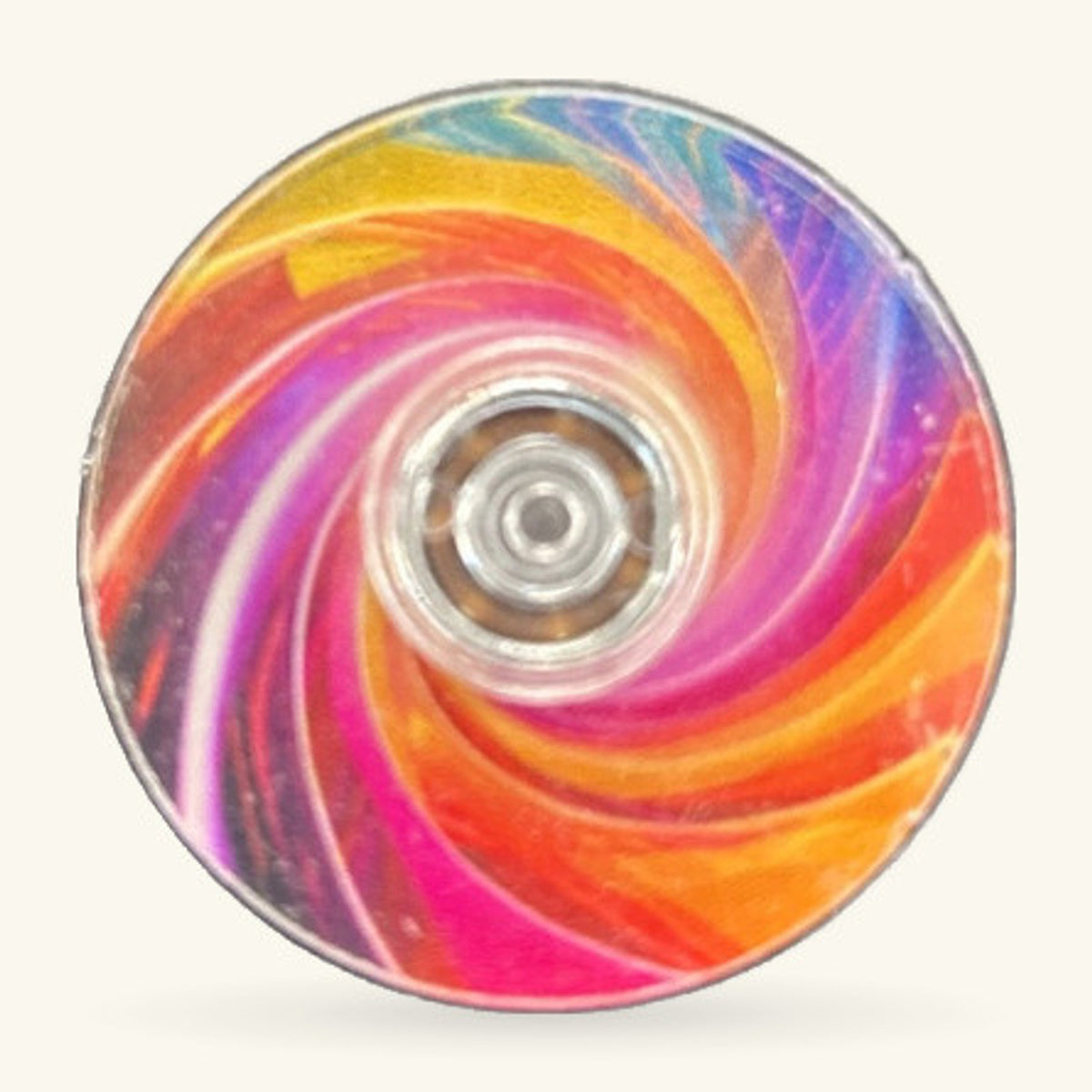 Pastel Rainbow Fidget Spinner with swirled gradient colours in pink, orange, yellow, and purple