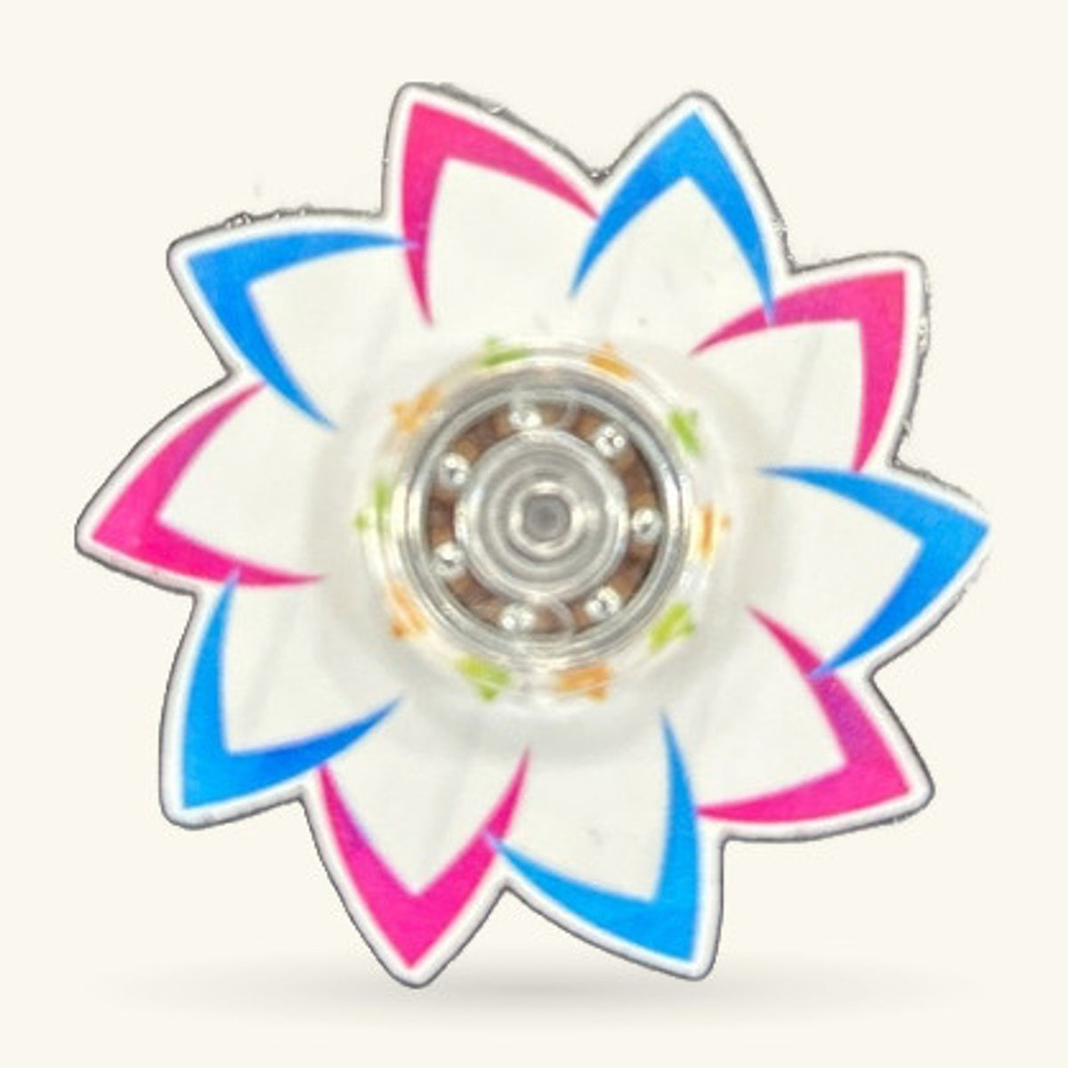 Blue and white flower-shaped fidget spinner with pink accents and a clear centre bearing