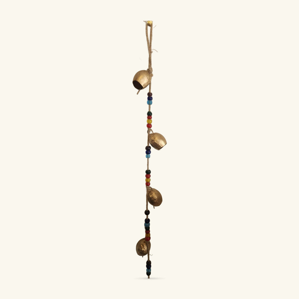 Vertical hanging strand with four gold-coloured iron bells separated by black and coloured glass beads on twine
