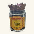 Glass jar of Wild Berry Fairy Dust incense sticks with brown wood tips and yellow label